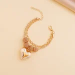 Gold Bracelet with A Heart Charm - Image 2