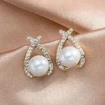 Cross Pearl Statement Studs
