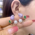 Floral pearl earrings for women with purple enamel flower design and gold finish