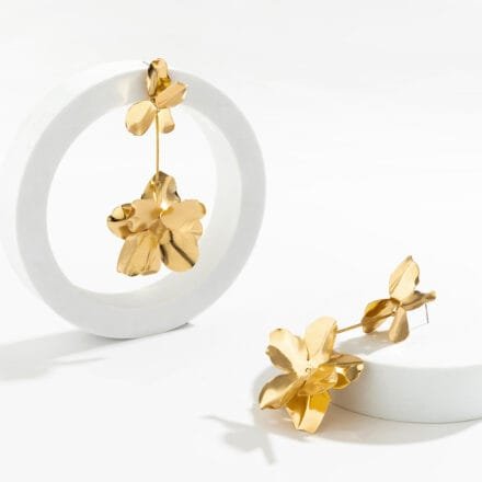 Elegant gold flower drop earrings for women with multi-petal floral design displayed on white background