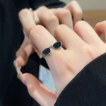 Woman wearing sunglasses trendy ring – quirky mini glasses design alloy adjustable finger ring India