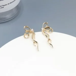 Butterfly Bowknot Earrings in gold with delicate ribbon twist and rhinestone detailing