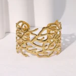 Gold Geometric Bracelet with abstract openwork design and wide cuff style