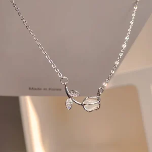 Elegant Tulip Pendant Necklace featuring a silver tulip flower pendant with crystal accents.