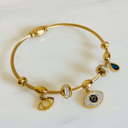 Gold Evil Eye Magnetic Bangle Bracelet with sparkling charms and blue evil eye pendant